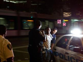 houston police arresting young man
