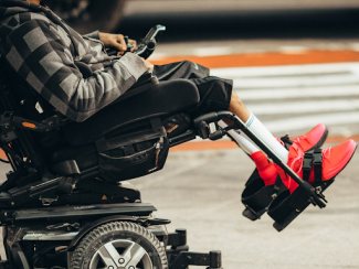 person in an electric wheel chair