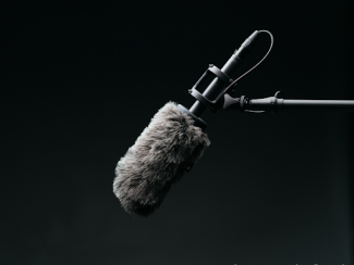 mic against a black microphone