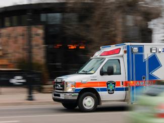ambulance rushing off 