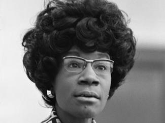 black and white photo of shirley chisholm looking ahead