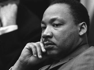martin luther king jr sitting down giving side eye