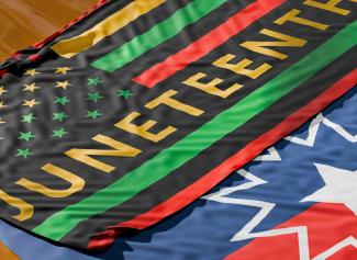 juneteeth flag with a star and stripes 