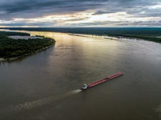 red boat on body of water