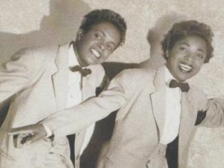 Jewel Welch & Edwinda Evelyn standing together