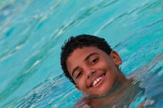 younger boy in the swimming pool