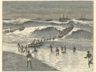 african people surfing in a wave