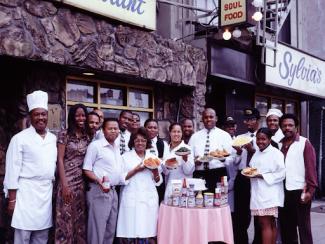 staff at a legendary soul food restaurant sylvia's in harlem new york
