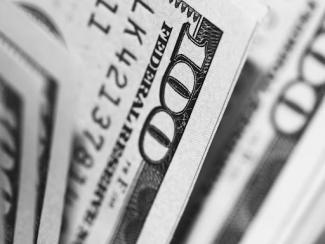 wad of one hundred dollar bills 