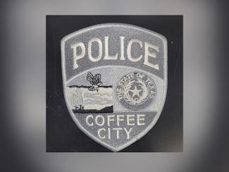 police badge coffee city
