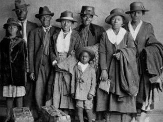 a black family in formal wear