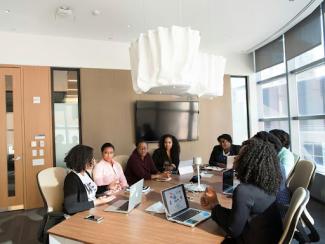 photo of people inside room during the day