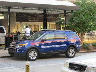 atlanta police vehicle in front of a business