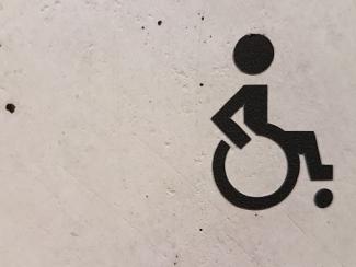 person with a disability  symbol with wheelchair 