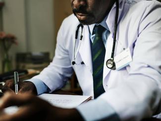 doctor checking medicine stock