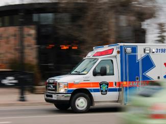 ambulance rushing down the street