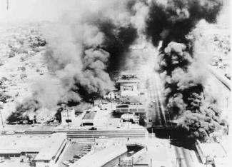 aerial view of buildings on fire