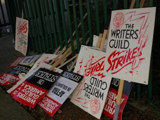 signs from writers guild strike