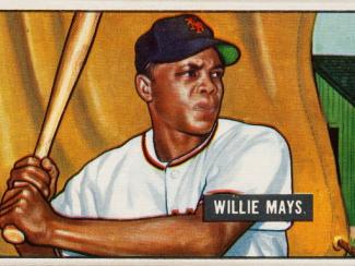 younger willie mays holding a bat