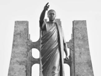 black and white photo of a statue of buddha 