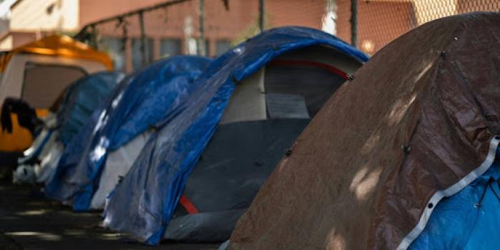 a row of tents sitting on the side